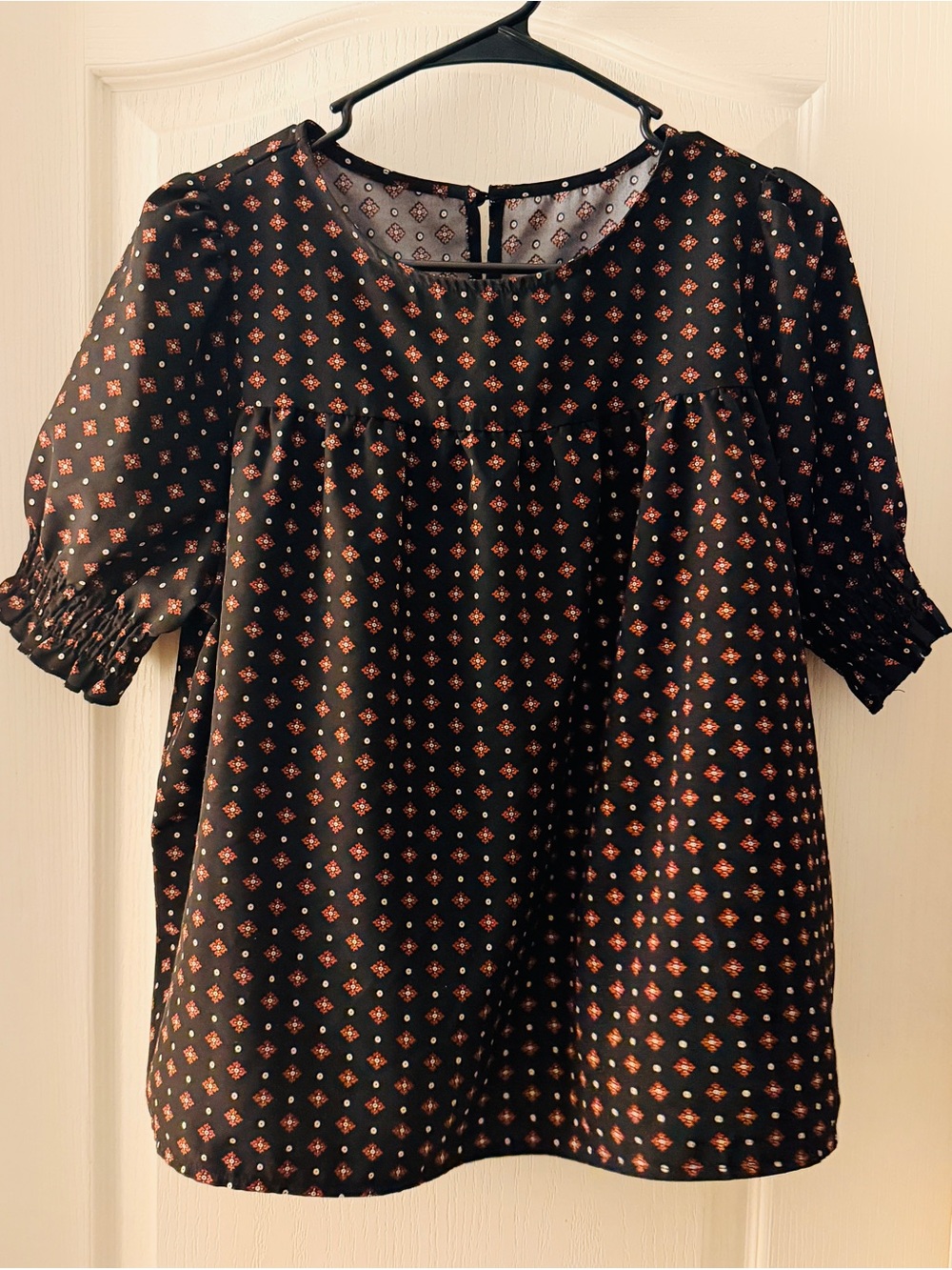 SHEIN Black Top with Orange Floral Motif